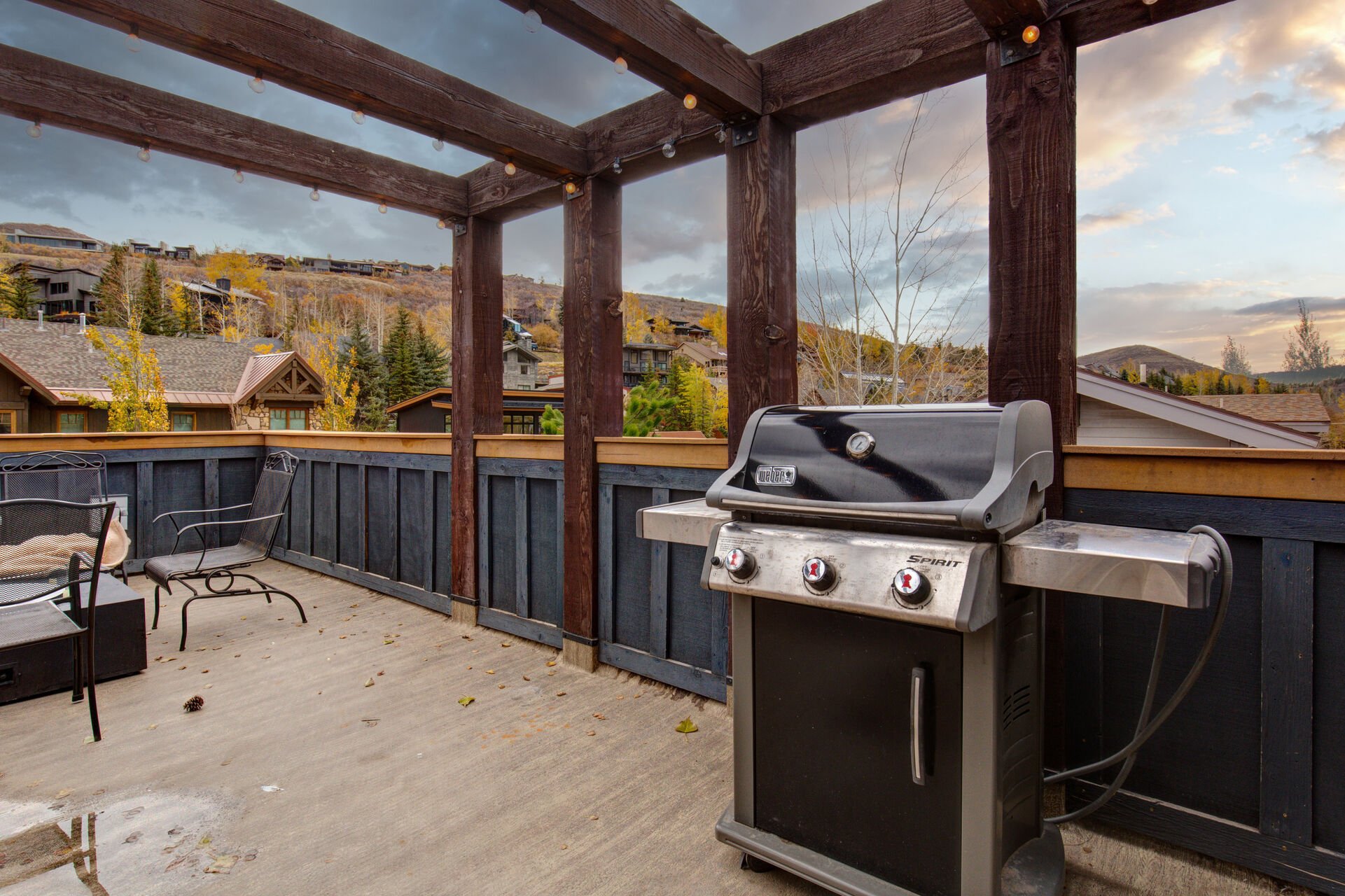 Private Roof Deck with Powder Room,  hot tub, two seating areas, outdoor fire-pit, BBQ, and stunning surrounding views of Park City