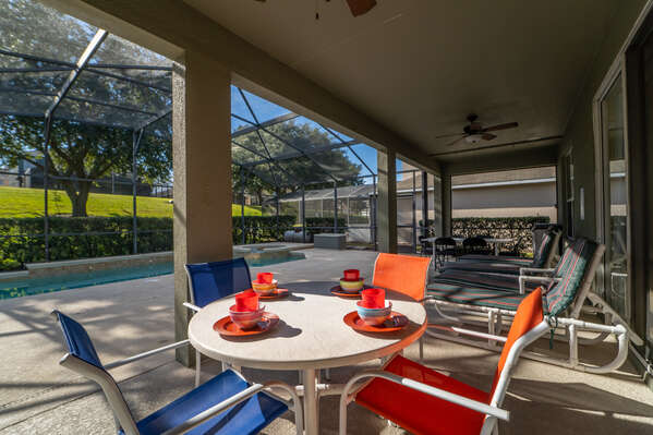 Shaded lanai with two patio tables