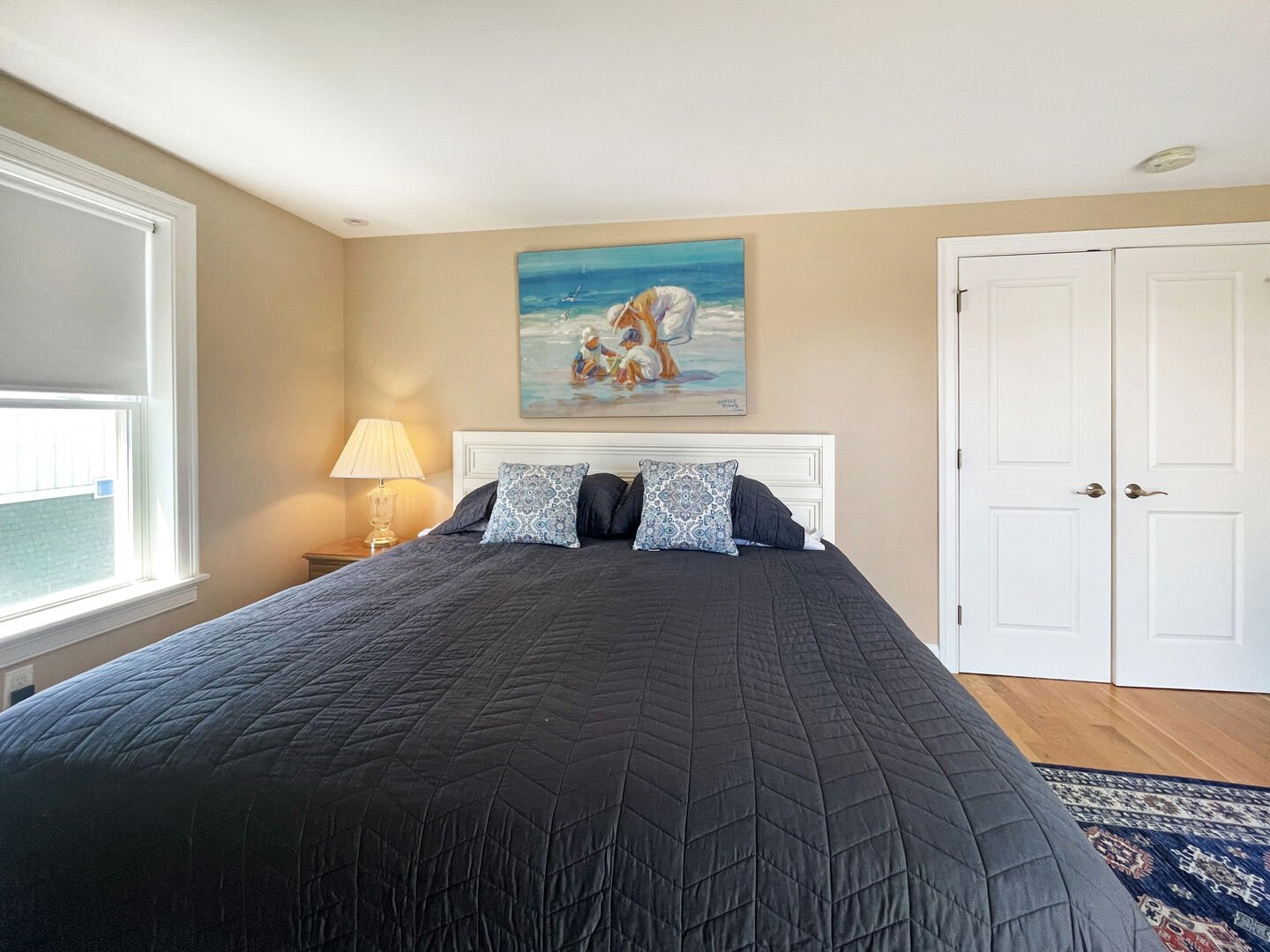 This spacious master bedroom comes complete with a master bath, and more importantly its own balcony! (1/4)
