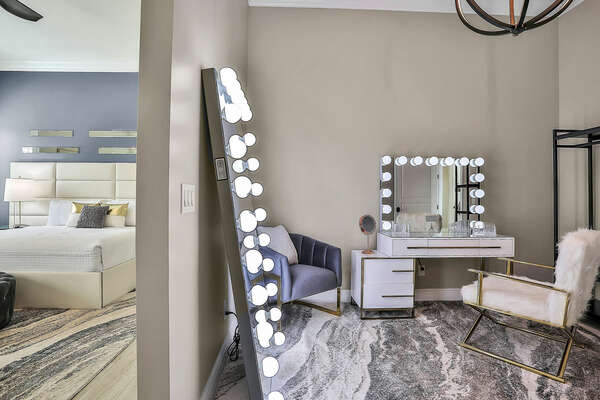This room is truly unique with its dressing/powder room, an excellent space to get ready in style.