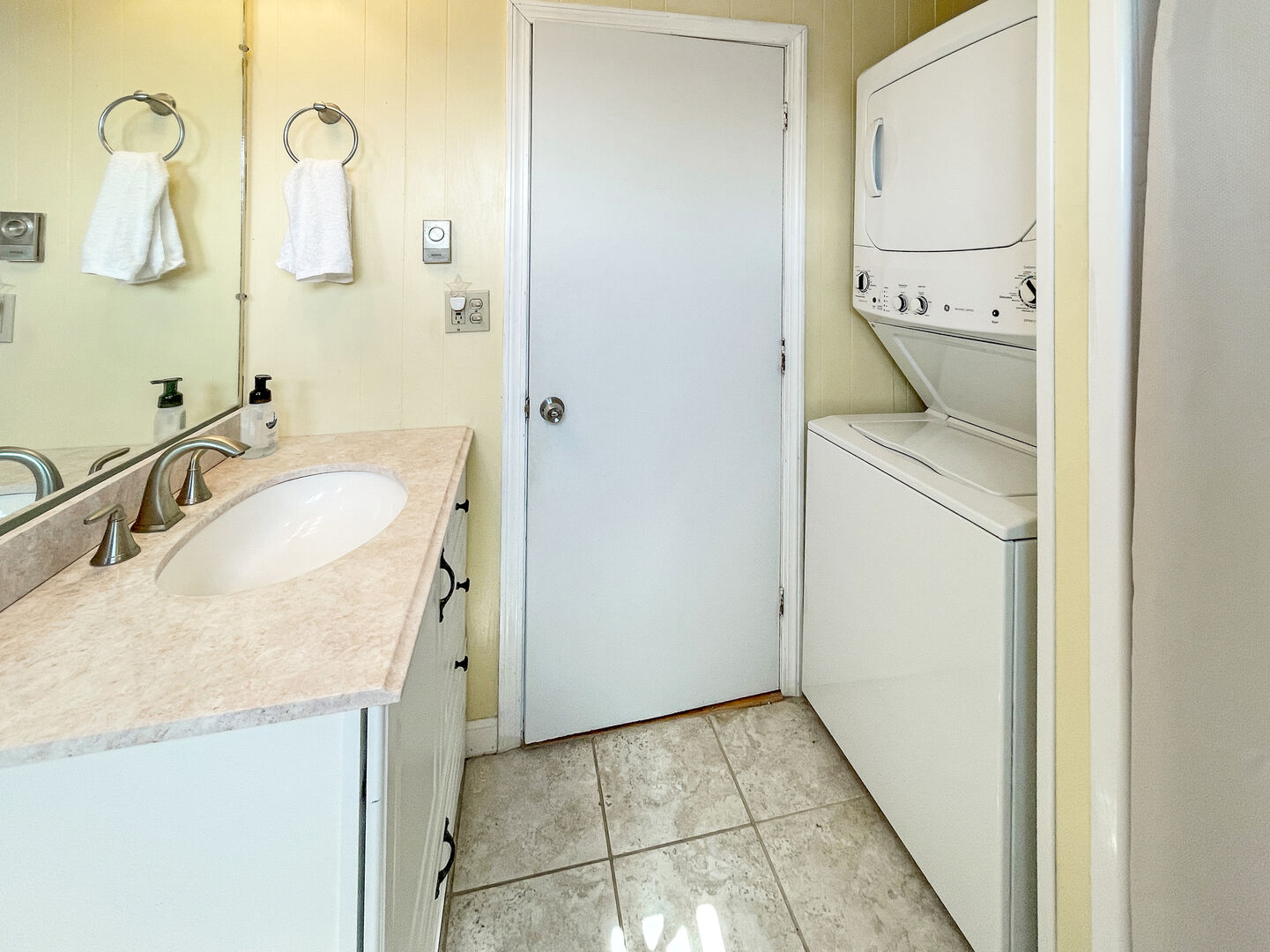 Bathroom with washer and dryer