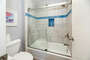Custom tiled tub shower combo in Master bath