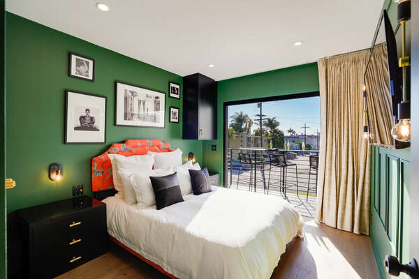 Custom Designed Master Bedroom w/ Folding Balcony Doors, Statement Emerald Walls, & Matte Black Finishings