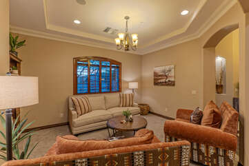 Formal living room invites you to chat with your favorite peeps or relax with a best seller.