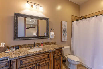 Bathroom 4 includes a tub-shower combo and door that leads directly to the pool area.