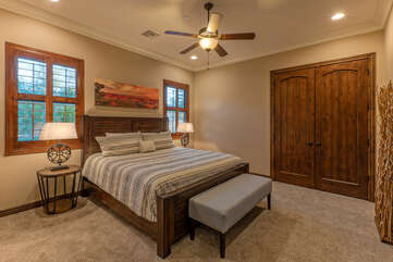 Bedroom 4 has a king bed, ceiling fan and TV, and shares a Jack and Jill style bath with Bedroom 5.
