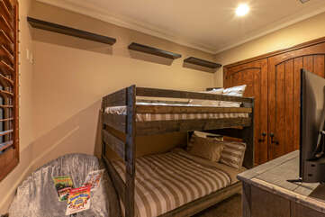 Bedroom 2 includes full size bunk beds, a TV and X Box, and shares the powder room.