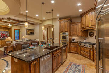 Kitchen is spacious with ample counter space for prepping and serving meals.