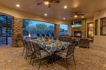 We're betting this covered patio with dining area and cozy seating will be your favorite gathering space.