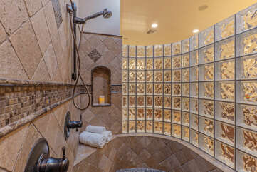 Wow! A snail shower with overhead heat lamps for a warm and refreshing shower.