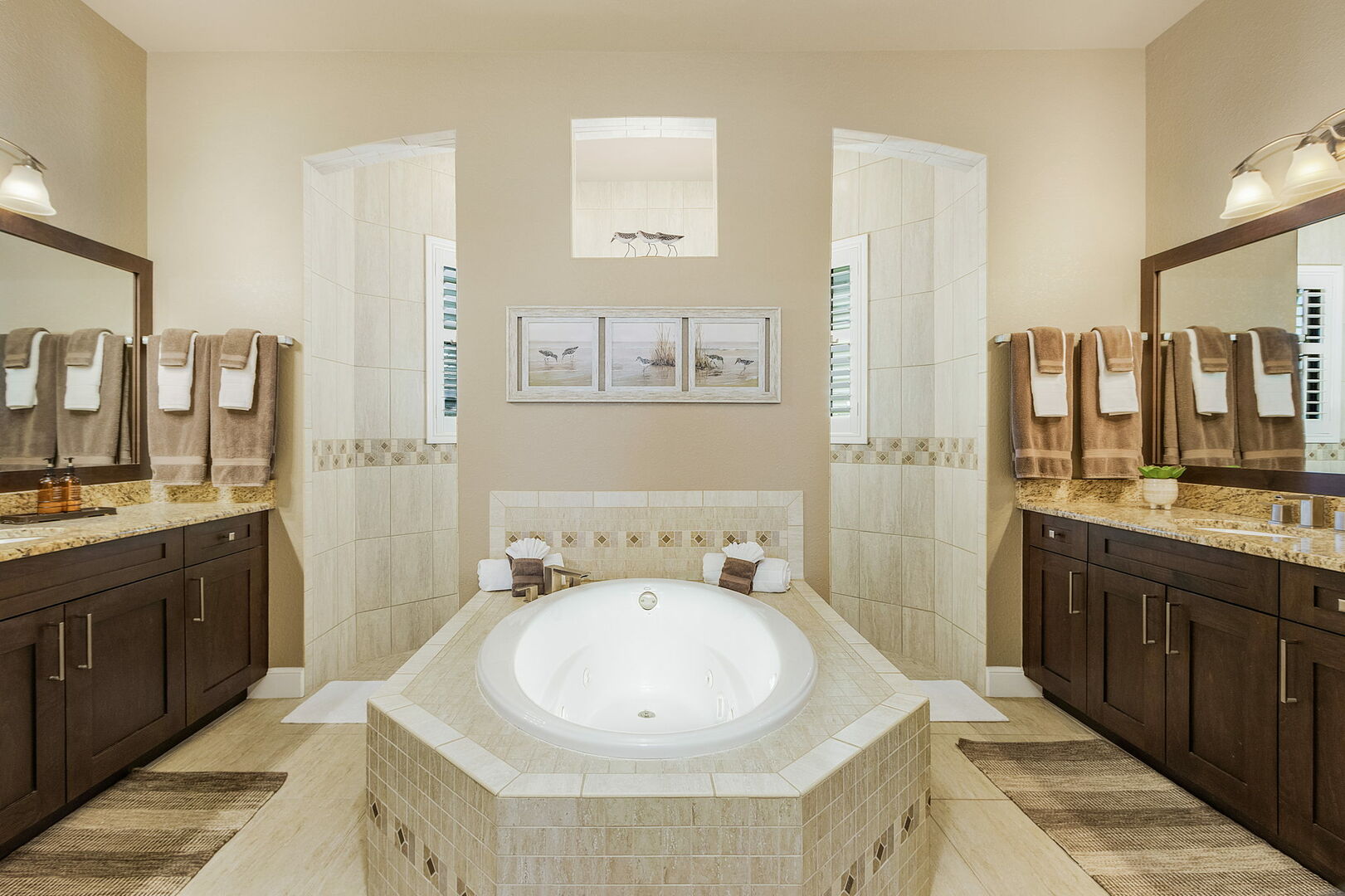 master bathroom with walk in shower and soaking tub