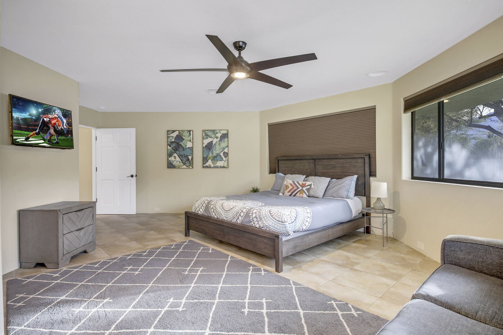 Stay cool under the a switch-controlled ceiling fan, and a large walk-in closet.