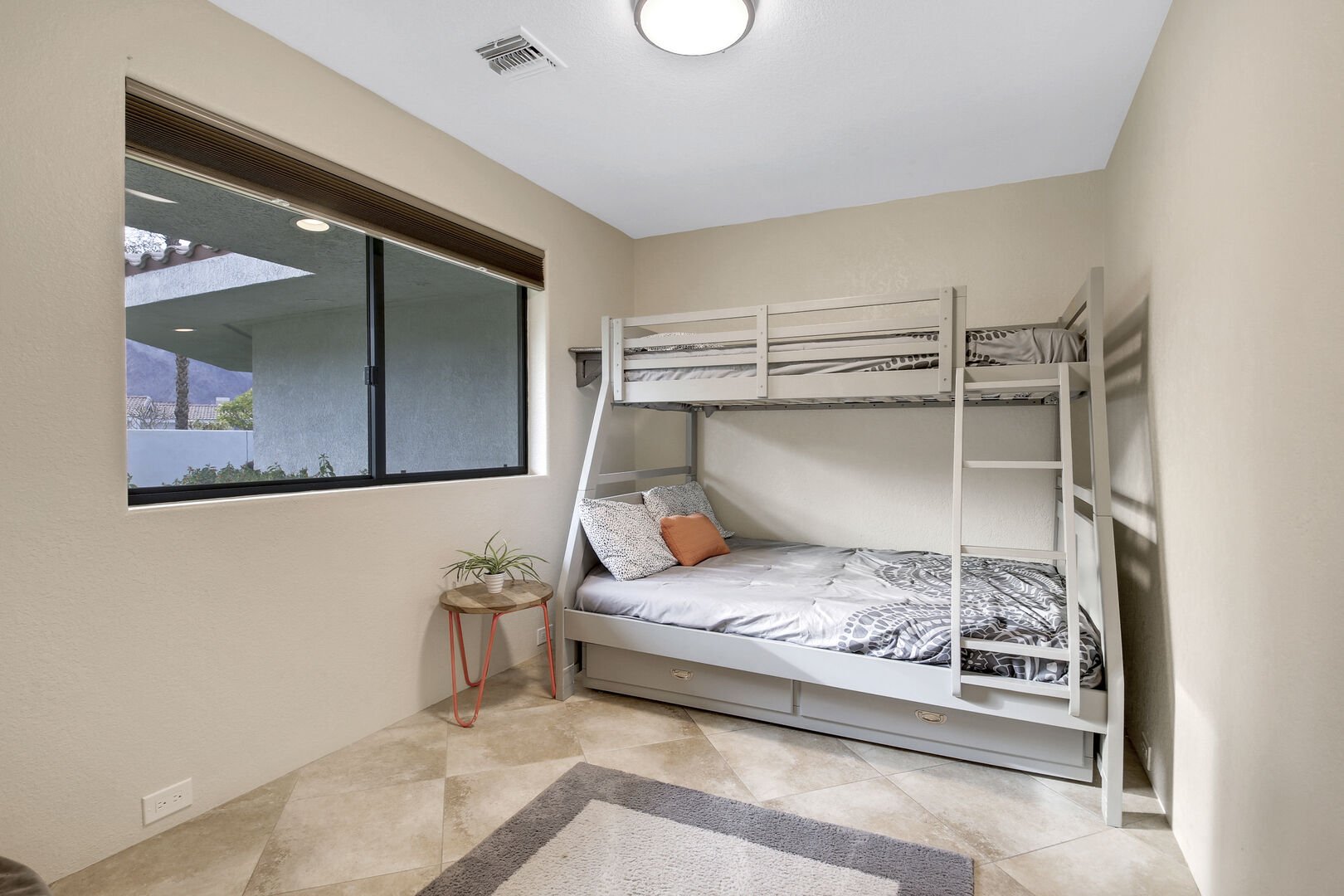  Bedroom 5 is located next to the front entrance and features a Twin Over Full with Twin Trundle Bunk Bed.