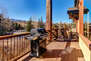 Wrap-around deck with BBQ grill, patio furniture for 4, and breath-taking views
