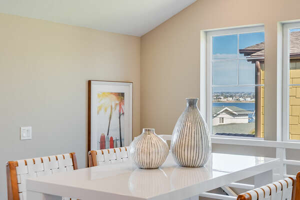 Peek-A-Boo Bay Views From Living and Dining Areas!