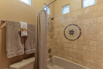 Bathroom 2 has a tub-shower combo to be used by Bedrooms 2, 3 and 4.