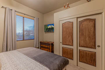 All bedrooms have ceiling fans and ample storage space for your personal items as seen in Bedroom 2.