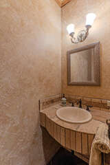 Powder room is conveniently located for swimmers and visitors.