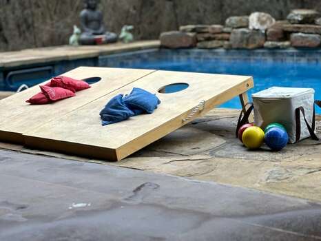 Several outdoor game options including Spikeball, Bocce Ball, and Cornhole for endless outdoor fun for the whole family