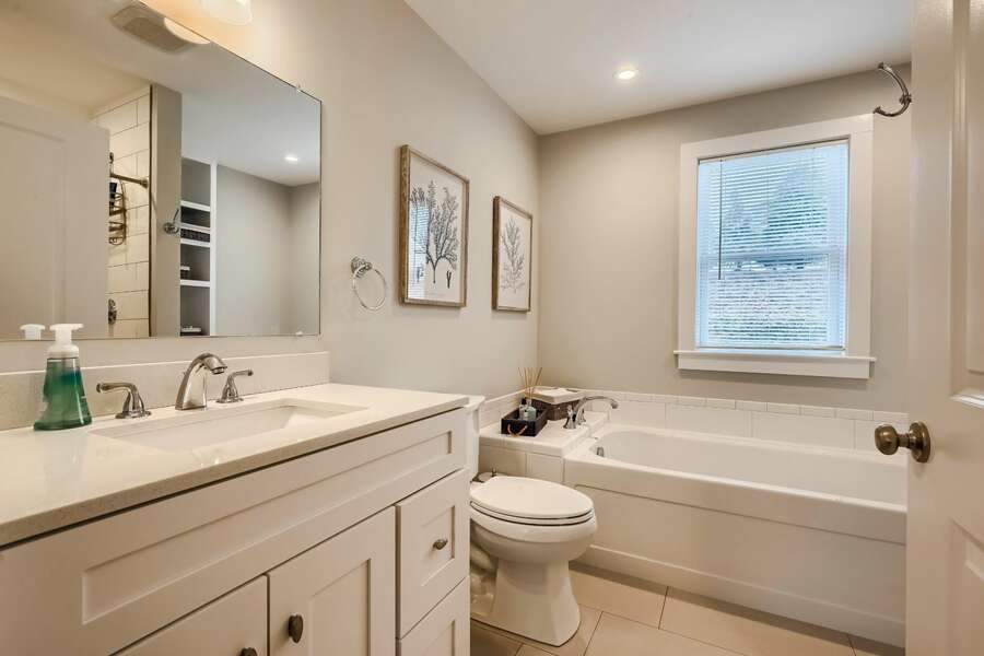 Bathroom # 1 with deep tub and shower, ensuite to bedroom #1 - 129 Hardings Beach Rd Chatham-Cape Cod-New England Vacation Rentals