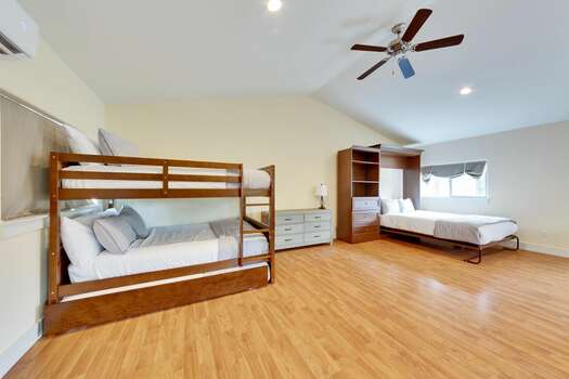 Bedroom 6 - Mother-in-law suite above garage with bunk bed, trundle, and queen bed plus living area.
