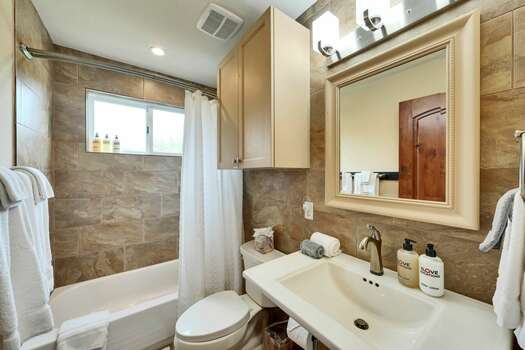 Upper Level Full Shared Bath with a Tub and Shower Combo