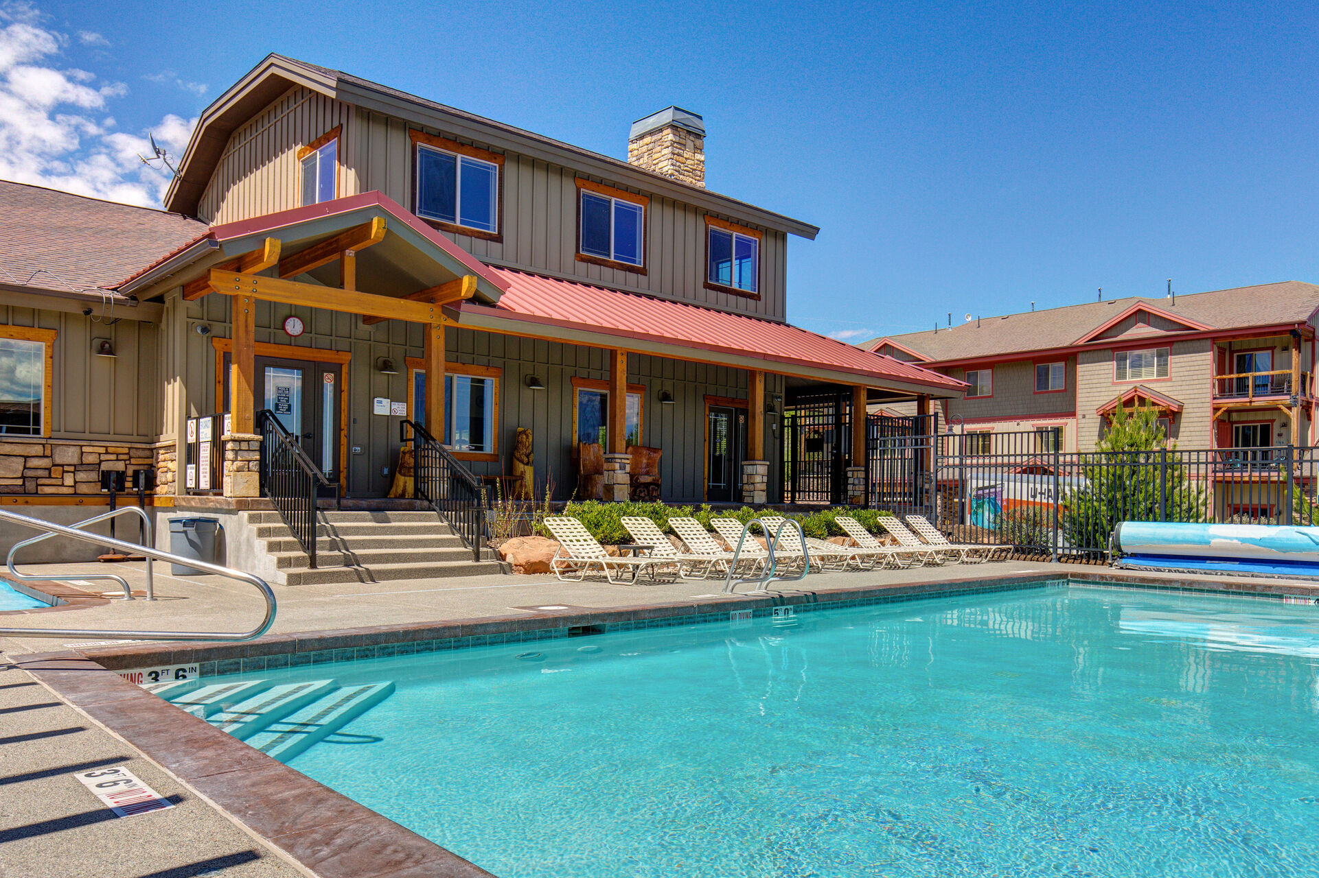 Bear Hollow Clubhouse located across the street with seasonal pool, hot tub, and fitness center