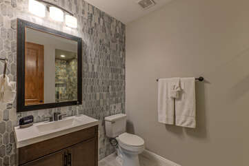 Bathroom 3 with a walk-in shower is an ensuite bath for Bedroom 3.