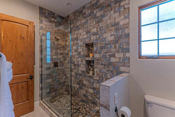 Bedrooms 4 and 5 share this beautiful Jack and Jill style bathroom with a walk-in shower.