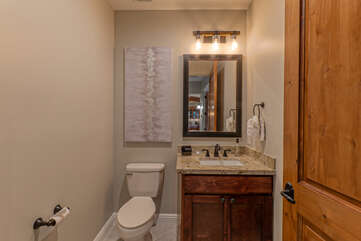 The powder room is convenient for Bedroom 2 and visitors.