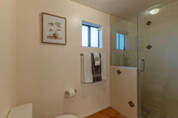Bathroom 3 is Jack and Jill style with a shared walk-in shower.