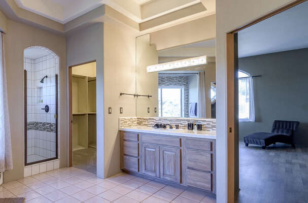 Master Bath with Two Vanities, a Shower and Walk-in Closet. Bathtub is currently not in use.