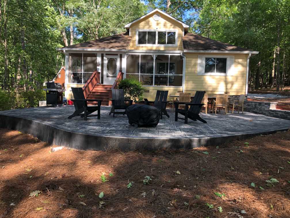 Patio includes fire pit and grill