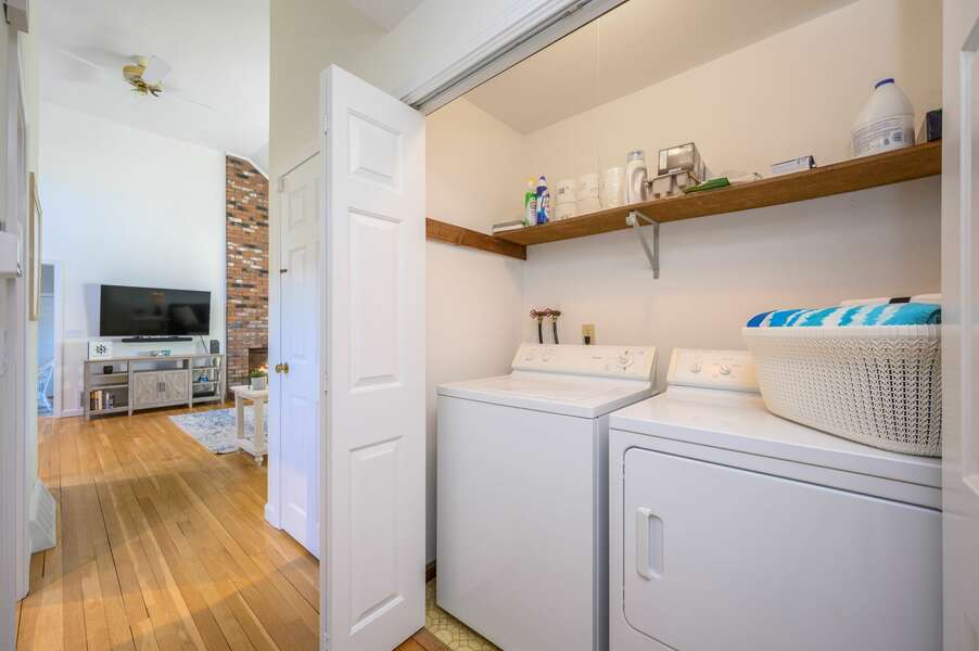 Laundry closet conviently located on the main floor in the hall-7 Deer Run Rd-Harwich- Cape Cod
