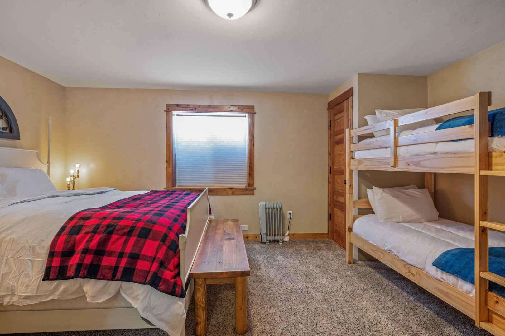 Liberty Lodge ~ bedroom #5 on lower level w/ king bed, single over single bunk bed, and private ensuite full bathroom