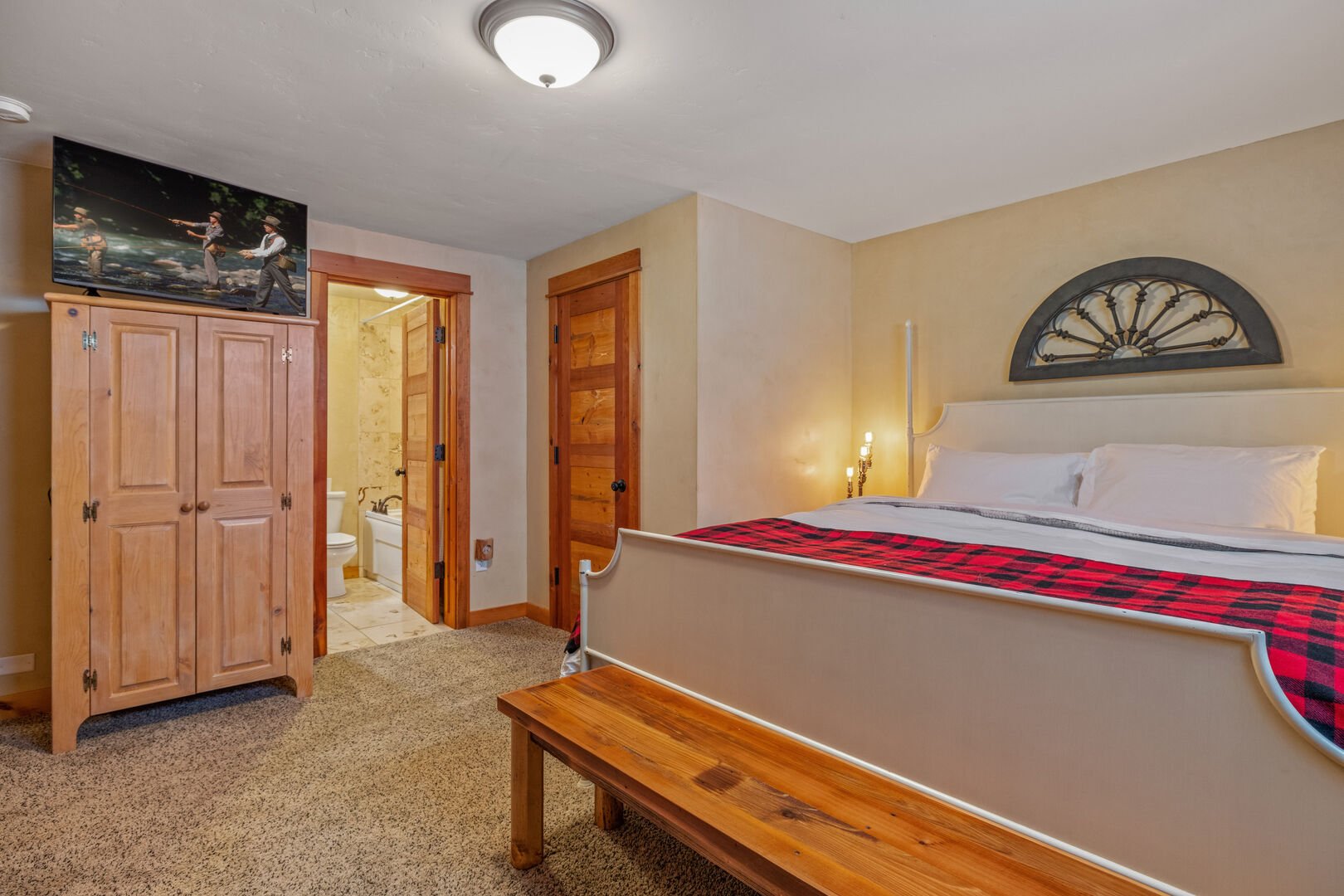 Liberty Lodge ~ bedroom #5 on lower level w/ king bed, single over single bunk bed, and private ensuite full bathroom