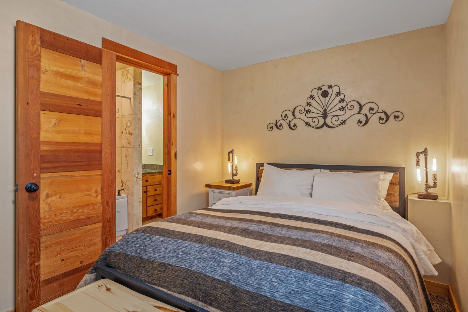 Liberty Lodge ~ bedroom #6 on lower level w/ queen bed and private ensuite full bathroom