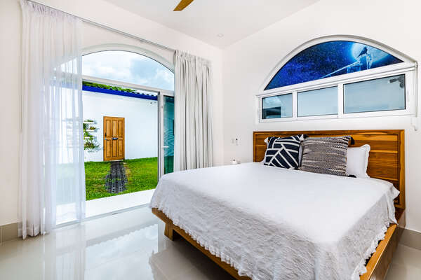 Bedroom #1: Your private gateway to the patio paradise.
