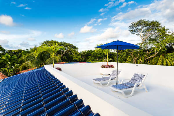 The perfect spot for sun-soaked days and tranquil evenings: our terrace with comfortable sunbeds.