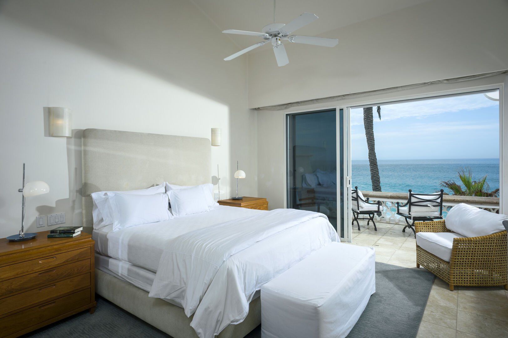 Master bedroom with a king-size bed and the ocean view