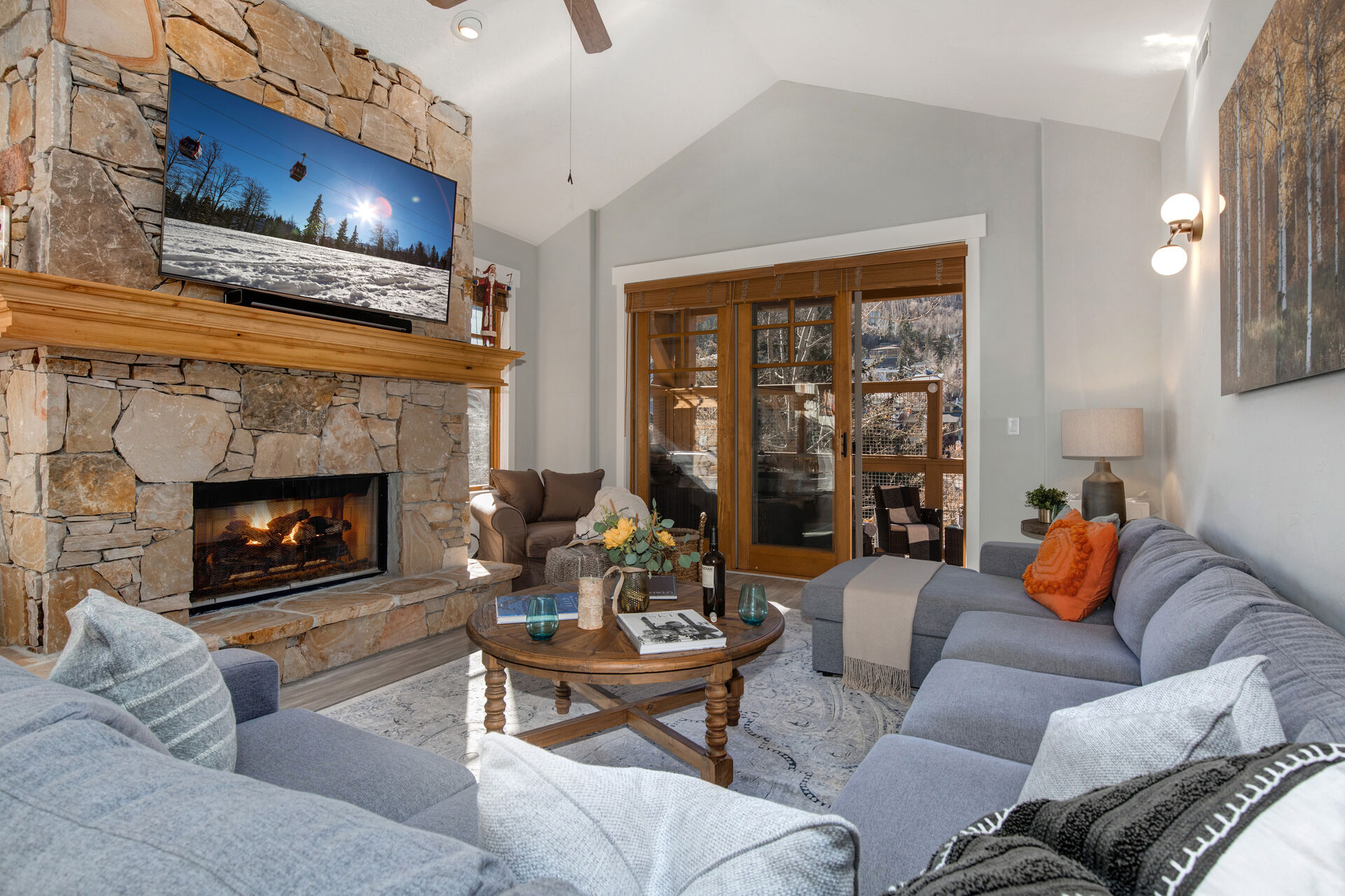 Living Room with over-sized sectional sofa, gas fireplace, 65