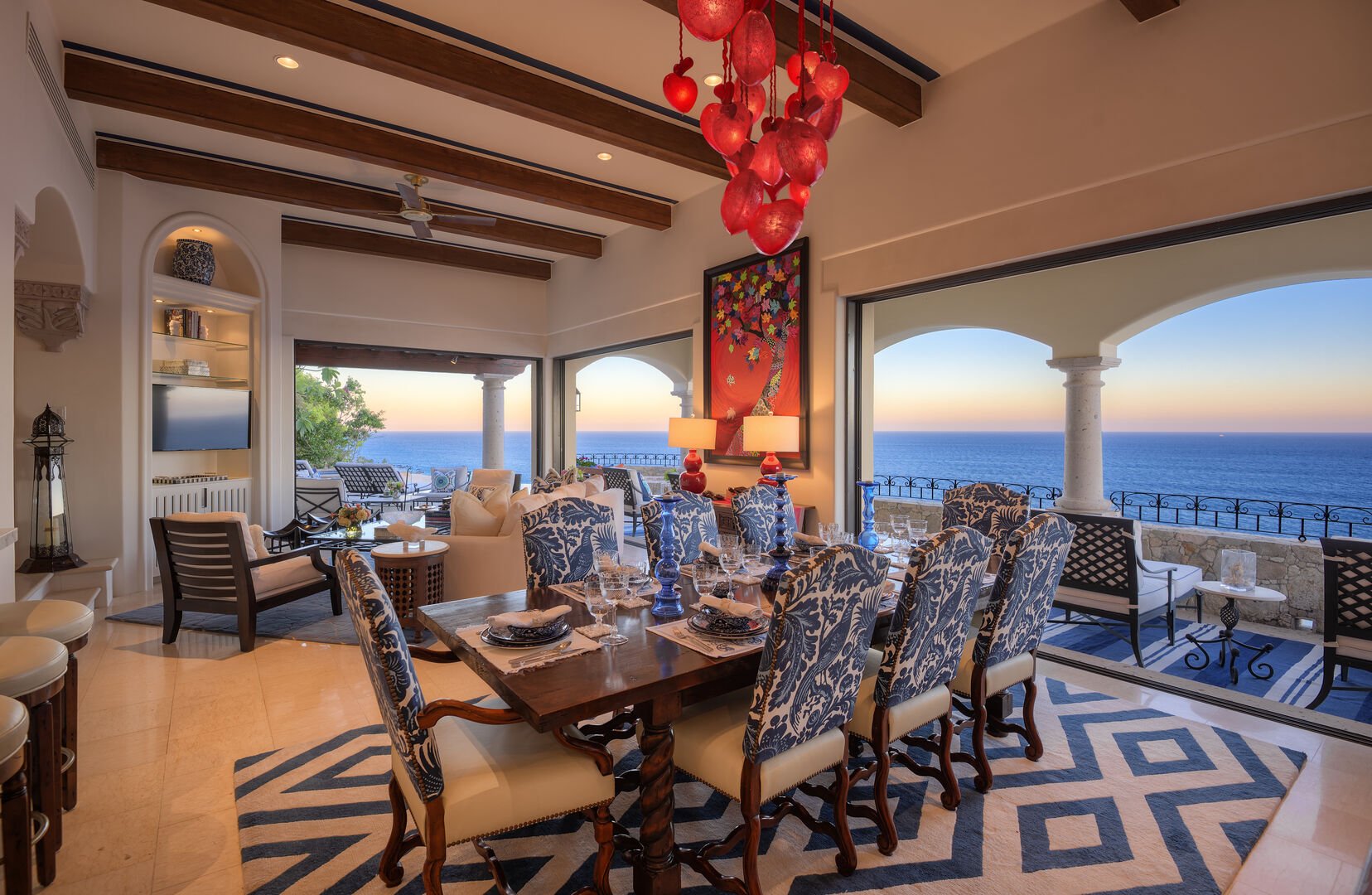 Dining and sitting area inside this villa in Los Cabos