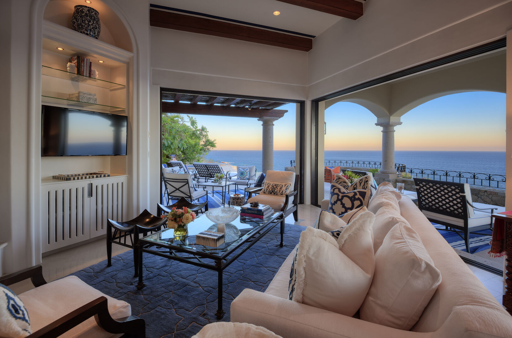 Living room with television and ocean views