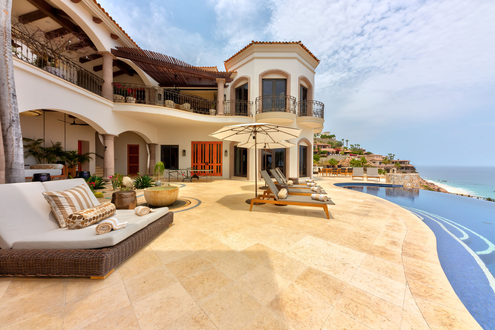 The pool lounge area with lounge chairs at the Hacienda 502