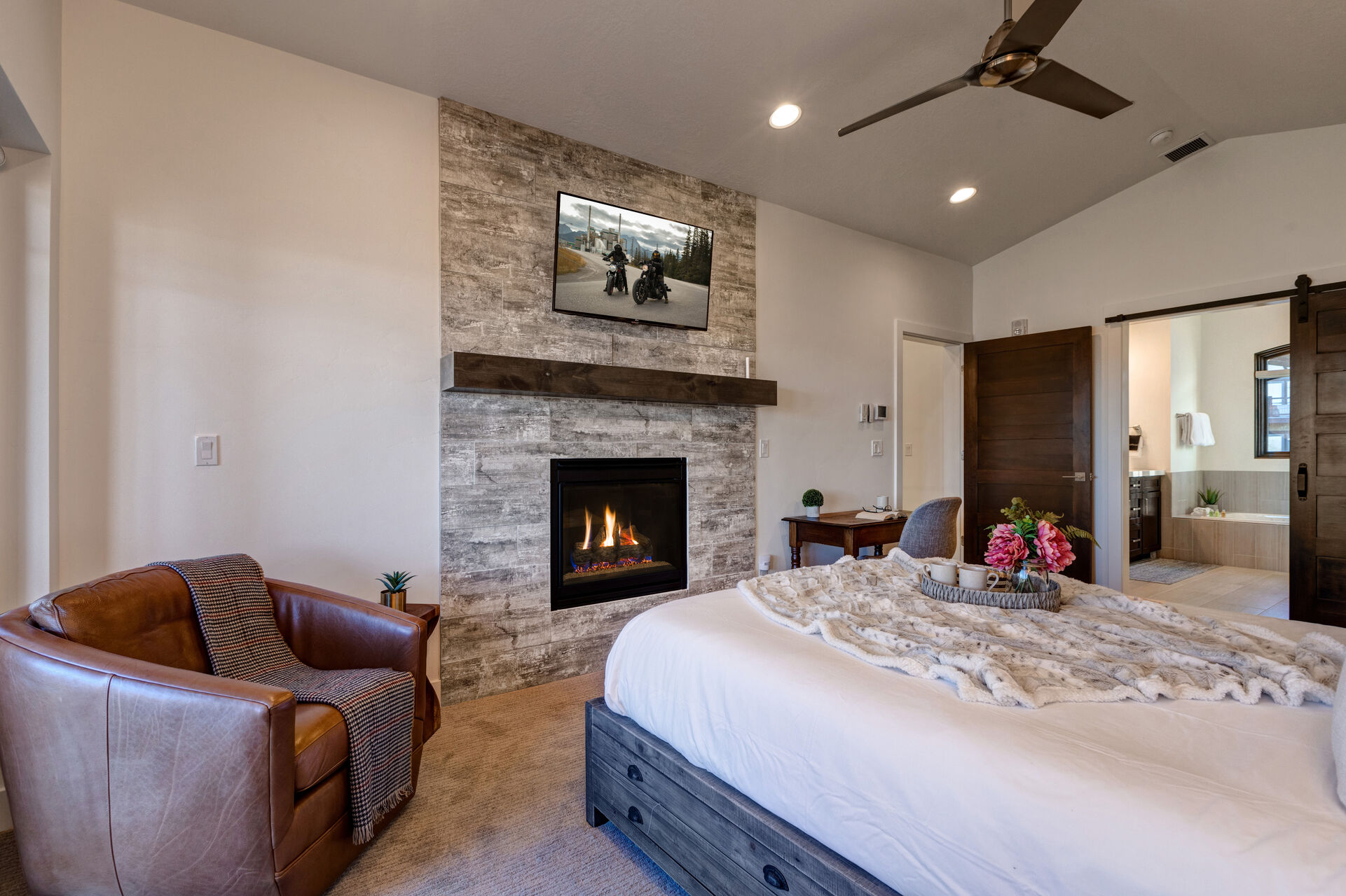 Master Bedroom with a King Bed, Gas Fireplace and Smart TV