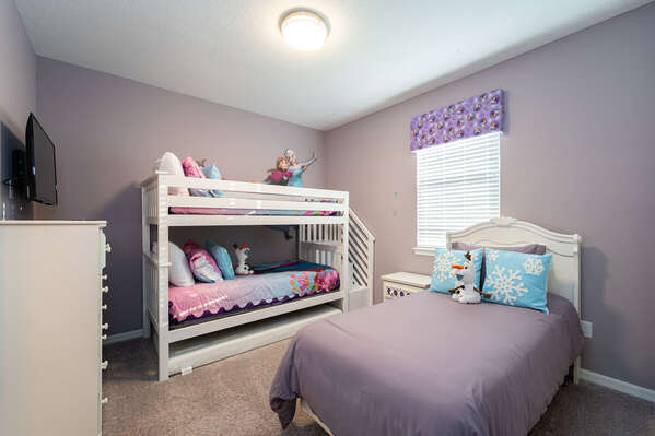 Upstairs Bedroom lightly themed with a twin over twin bunk  bed and twin bed, sleeps up to 3