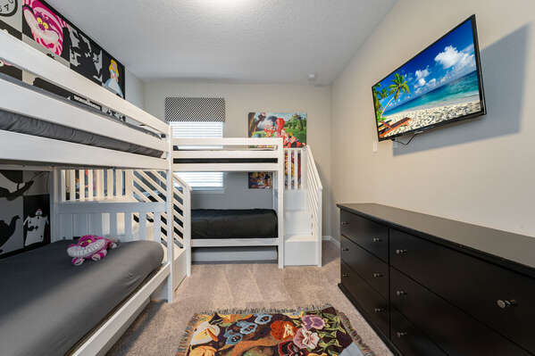 Upstairs Bedroom showing bunk beds and TV