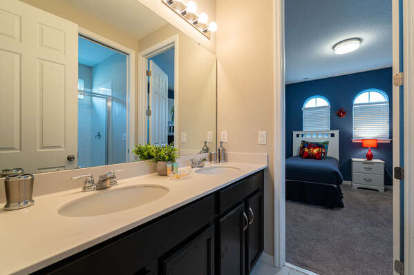 Shared bath with dual sink vanity and shower