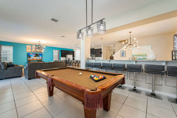Enjoy the pool views and a game of pool on this quality billiards table and 6 stools