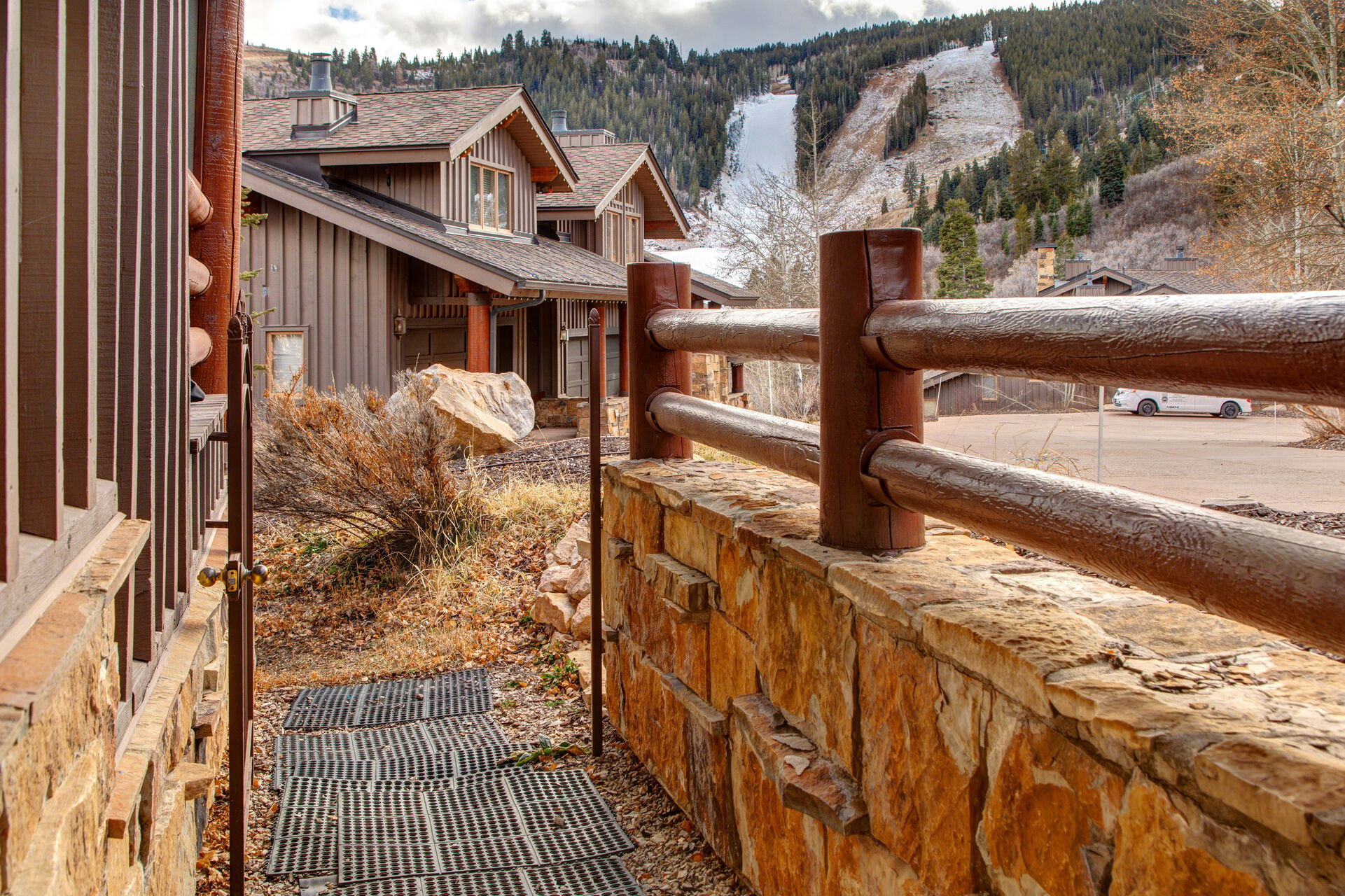 Mid Level Ski Access with equipment hooks, ski trail access, and outdoor ski storage